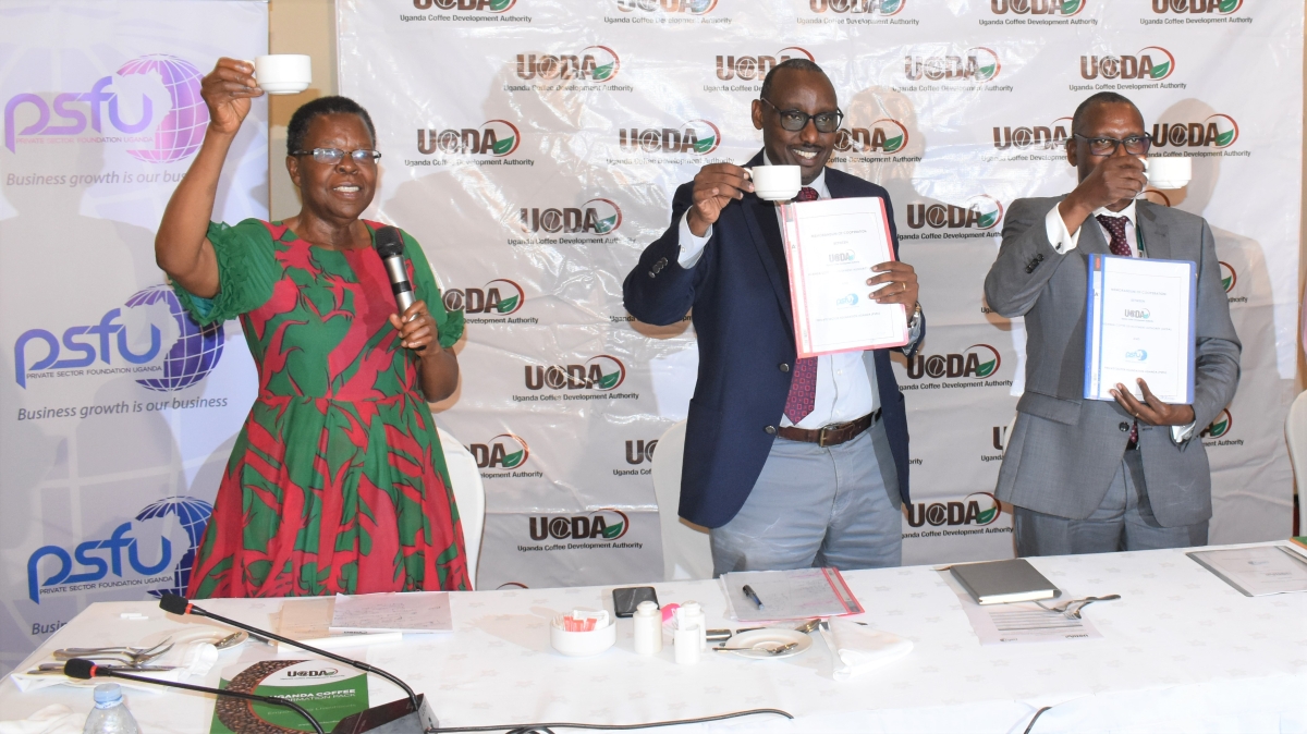 Sekitoleko, Asiimwe and Lyamulemye during the signing of the memorandum