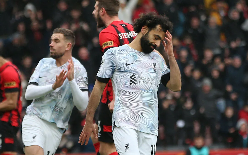 Liverpool go from seventh heaven to defeat at Bournemouth as Salah shoots wide to miss penalty