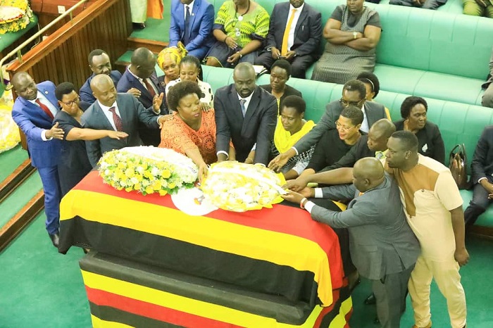 Speaker Anita Among (fourth right), the Vice-President (sixth right) and other MPs laying wreaths