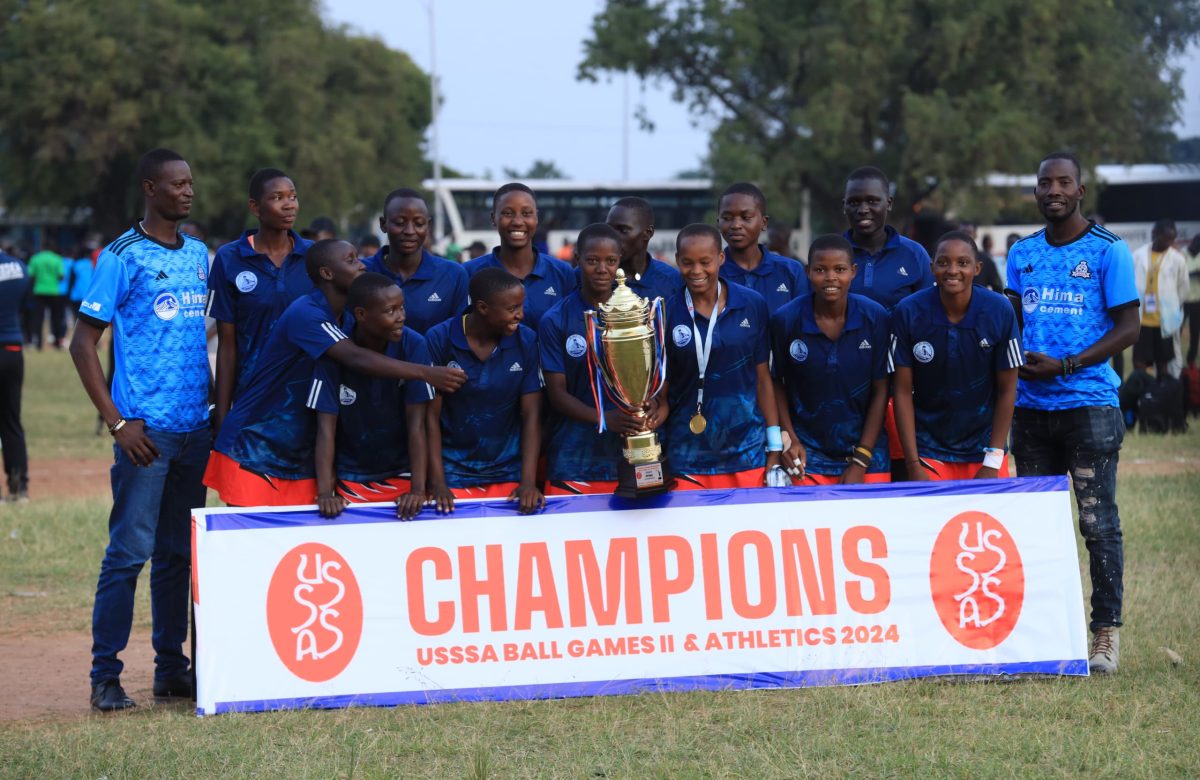 St Marys Kitende Girls Netball team with the trophy