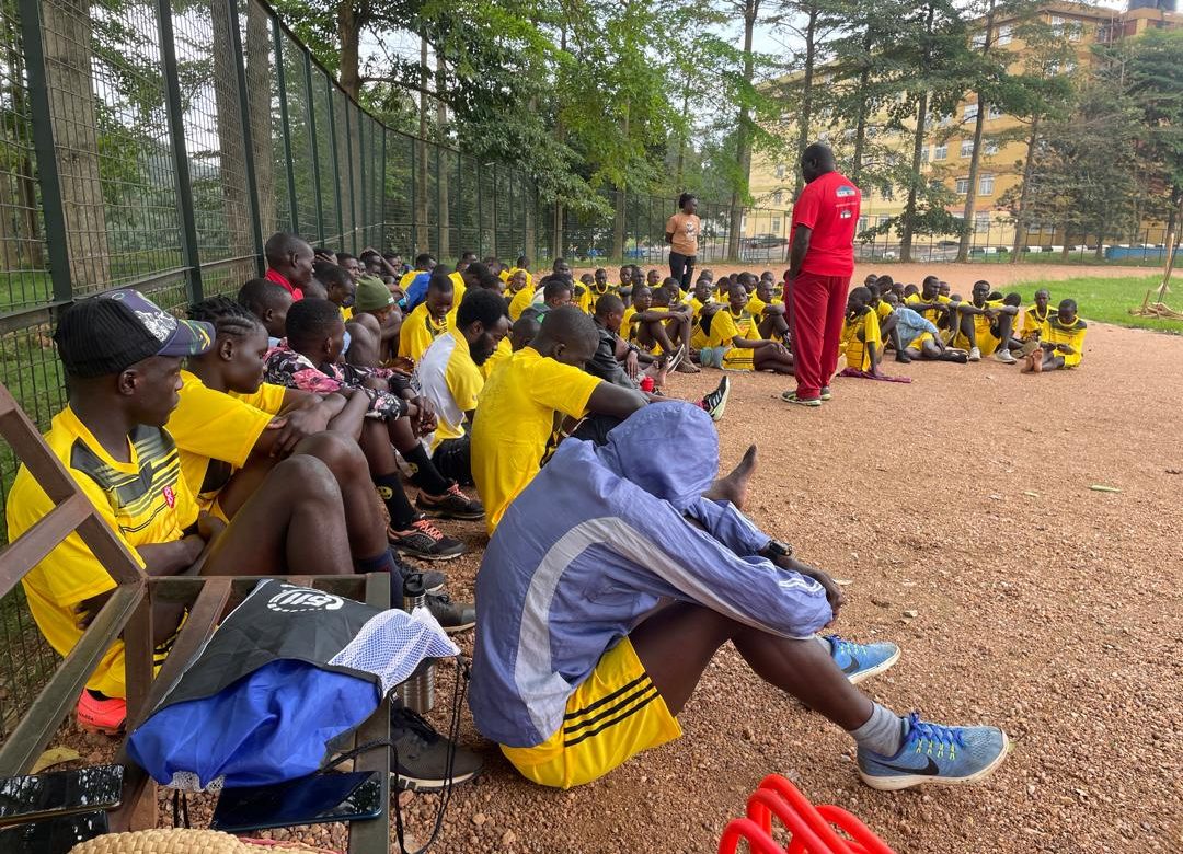 Uganda athletics team in team talk after todays morning training at Ndejje